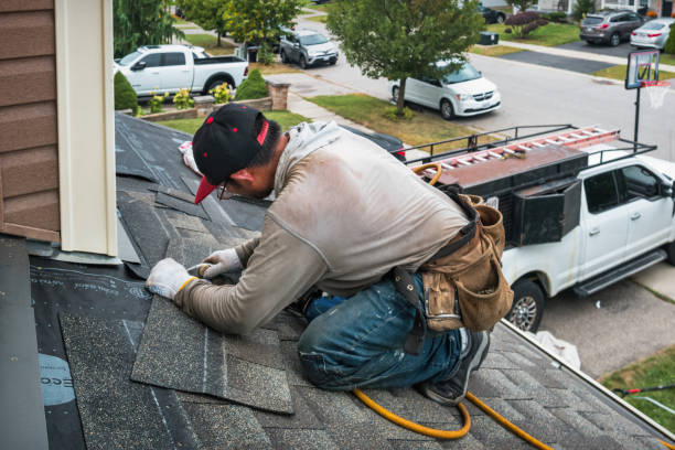 Professional Roofing technician working in Farmersville, CA